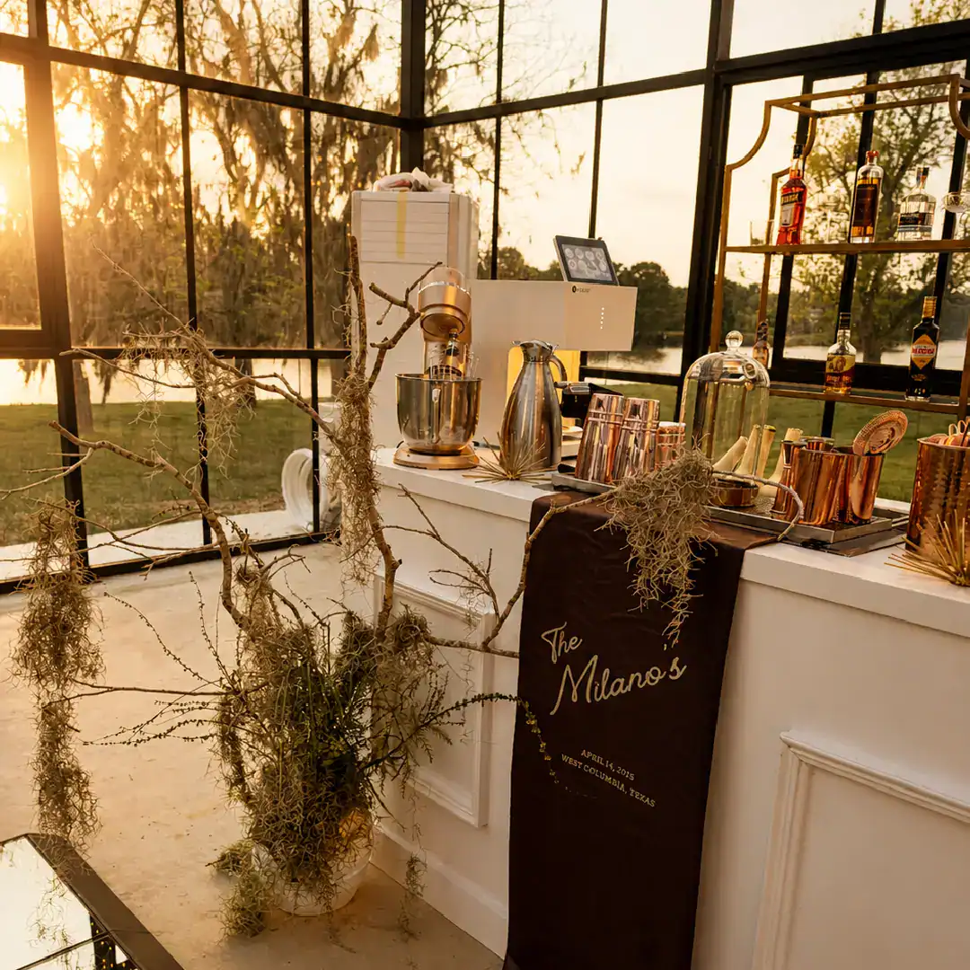 bar at wedding ceremony inside glass venue near houston texas