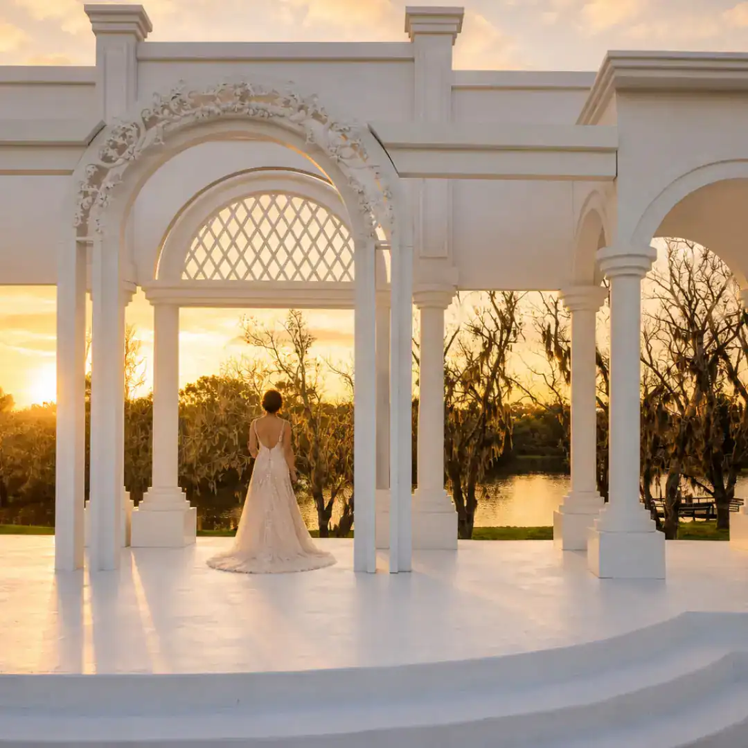 bride looks over elegant ceremony space near houston at a courtyard venue